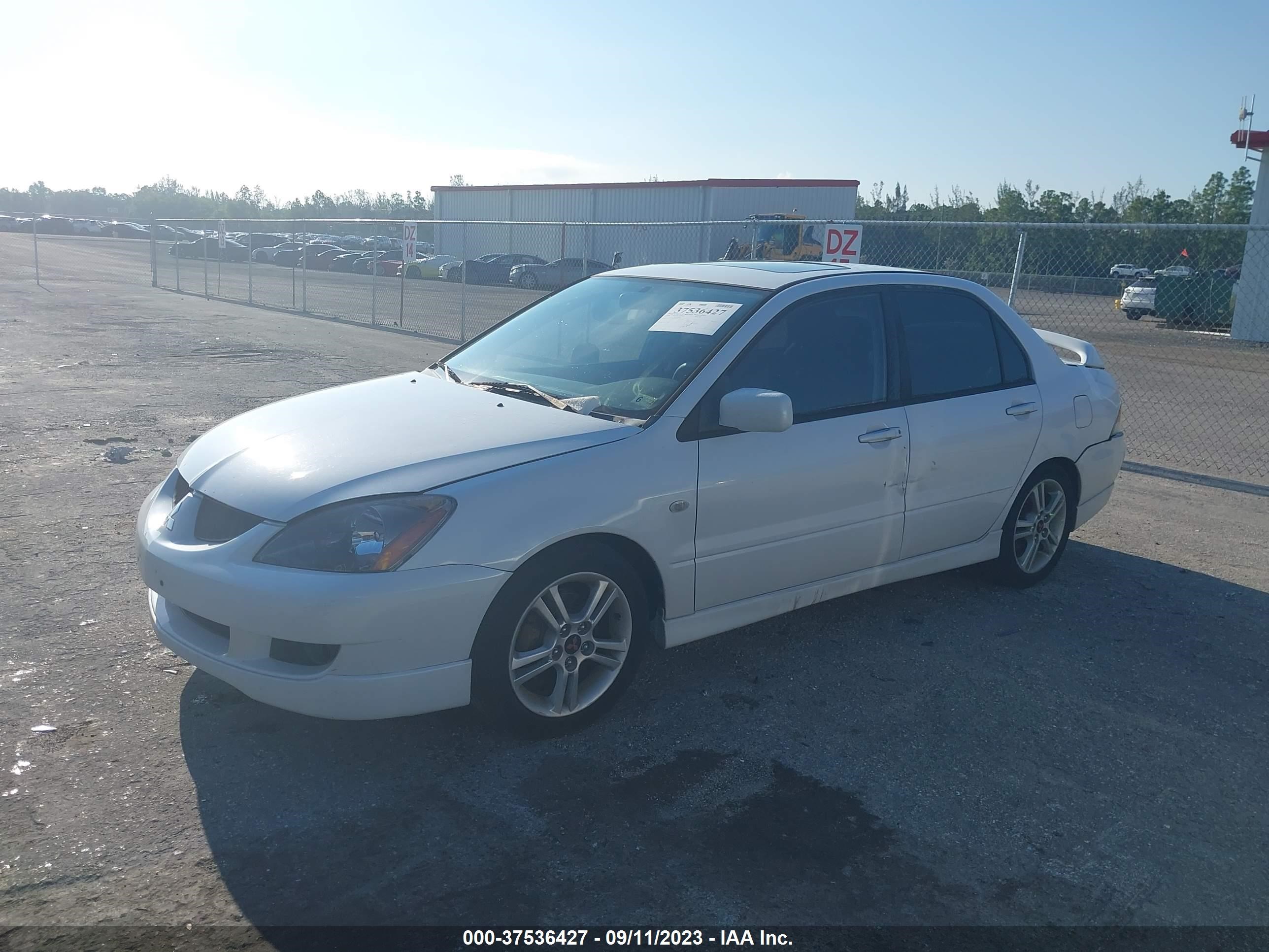 Photo 1 VIN: JA3AJ66FX4U042186 - MITSUBISHI LANCER 