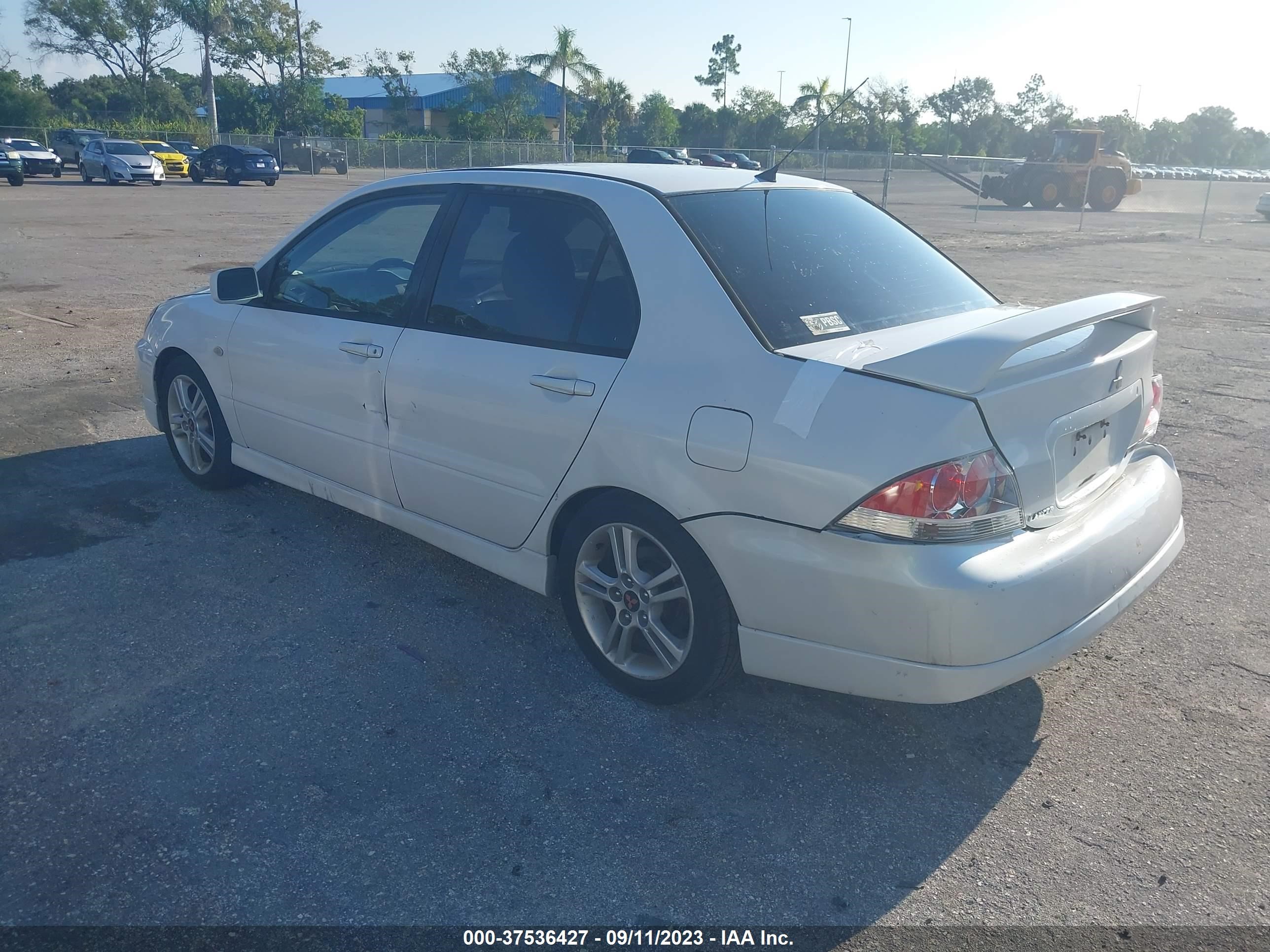 Photo 2 VIN: JA3AJ66FX4U042186 - MITSUBISHI LANCER 