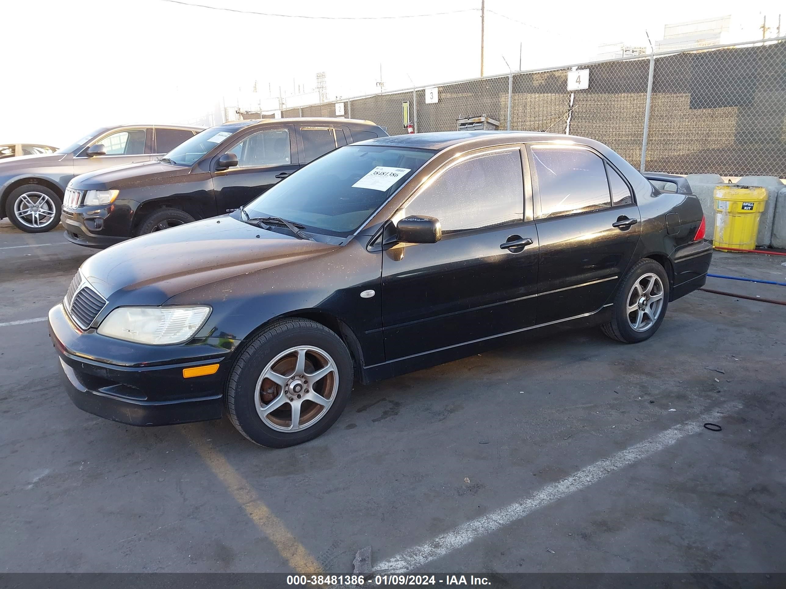 Photo 1 VIN: JA3AJ86E32U046094 - MITSUBISHI LANCER 