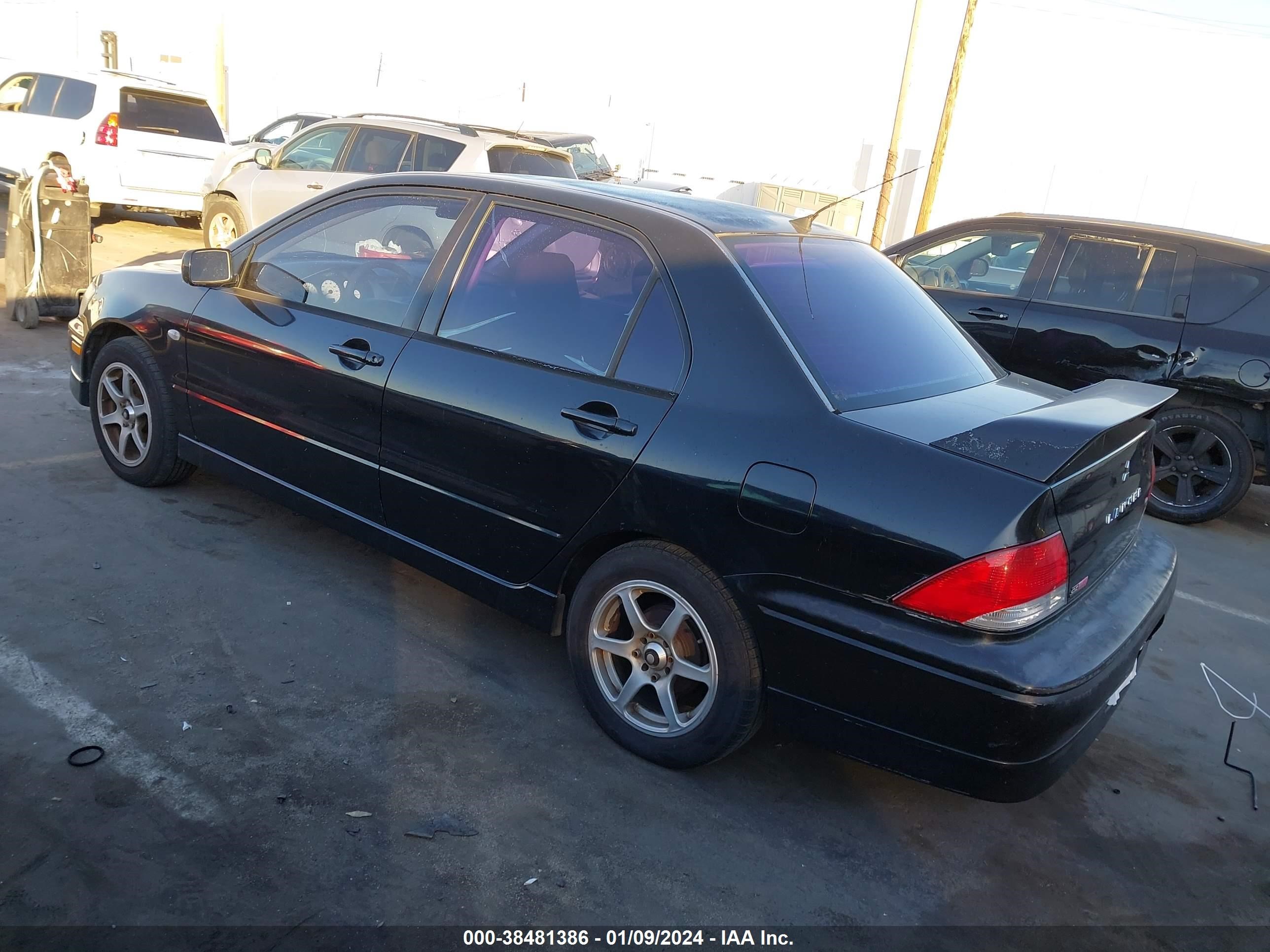 Photo 2 VIN: JA3AJ86E32U046094 - MITSUBISHI LANCER 