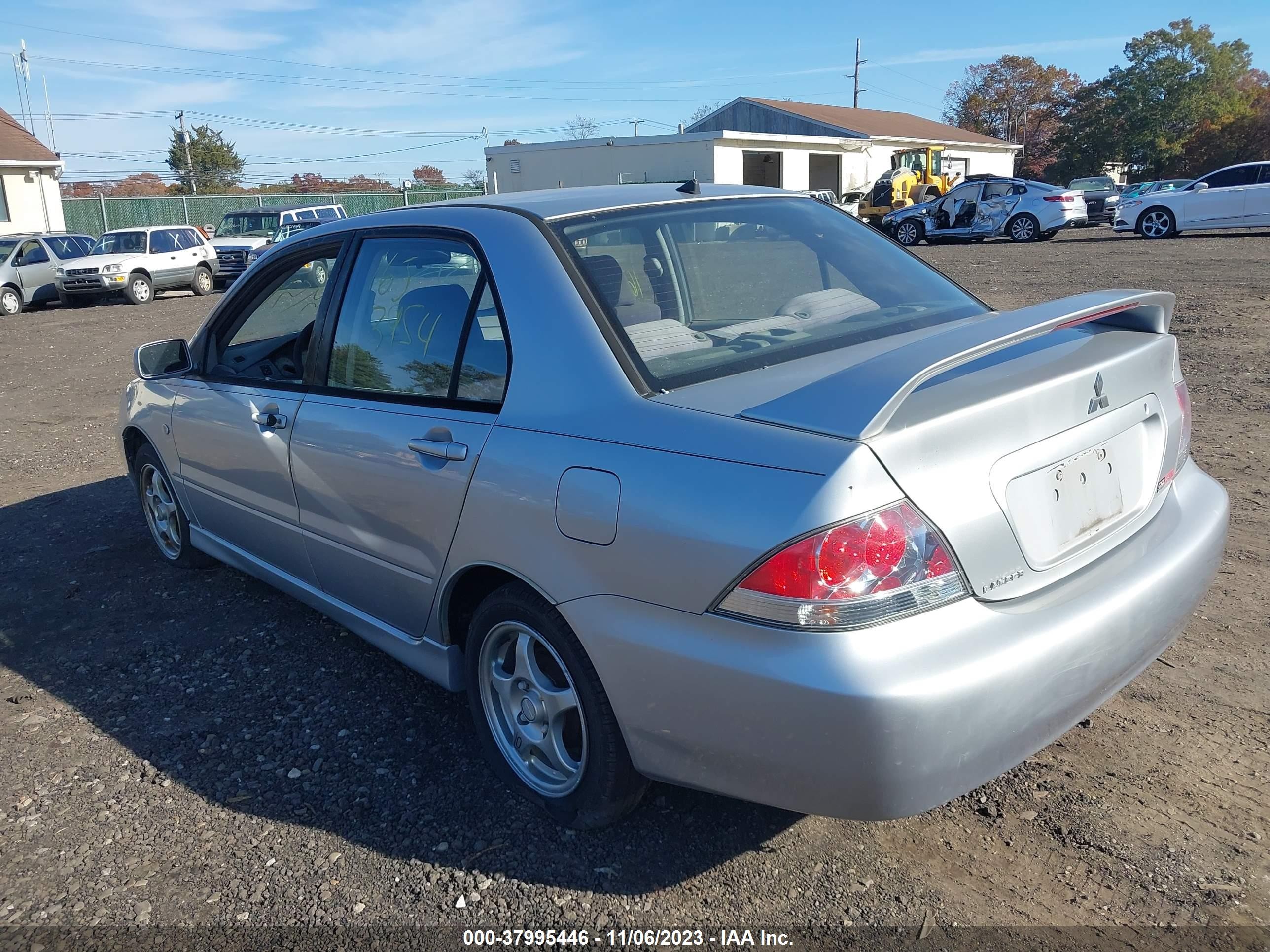 Photo 2 VIN: JA3AJ86E64U040681 - MITSUBISHI LANCER 