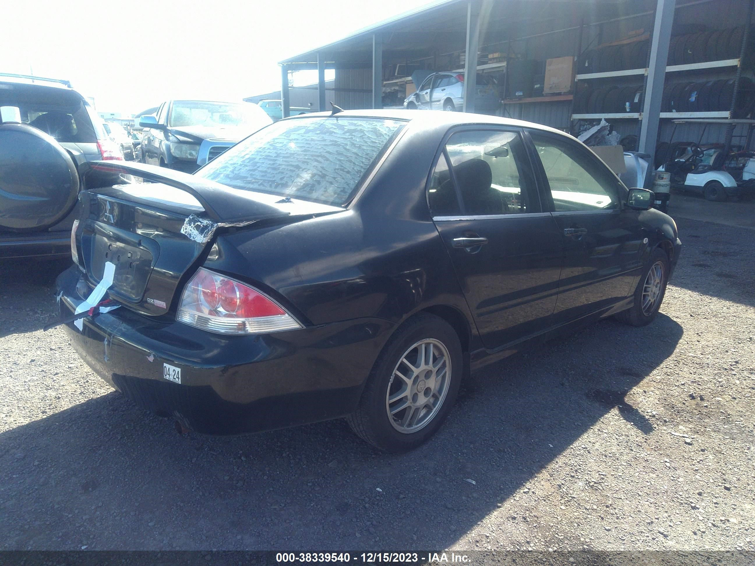 Photo 3 VIN: JA3AJ86EX5U040345 - MITSUBISHI LANCER 