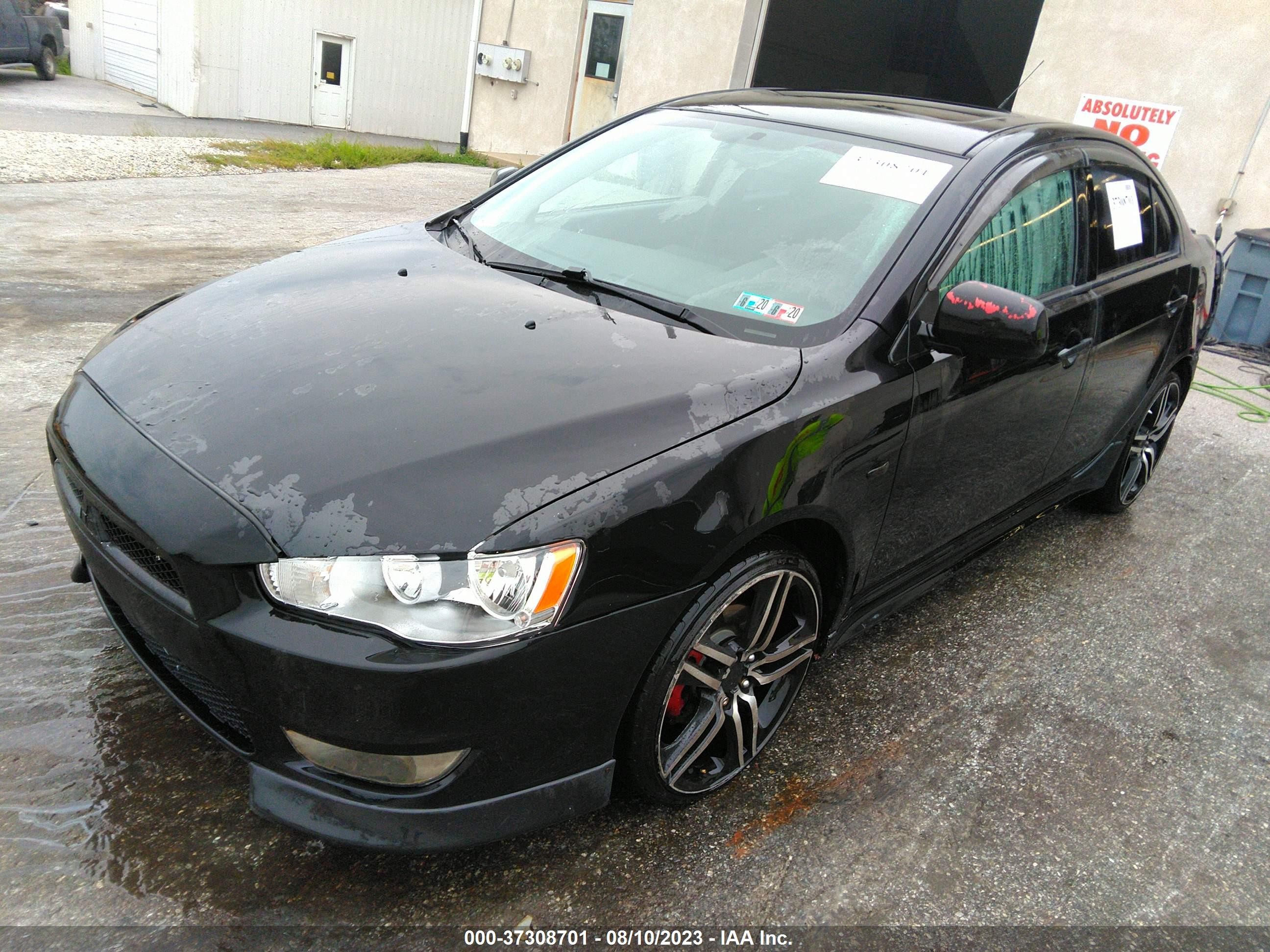 Photo 1 VIN: JA3AU86WX9U021557 - MITSUBISHI LANCER 