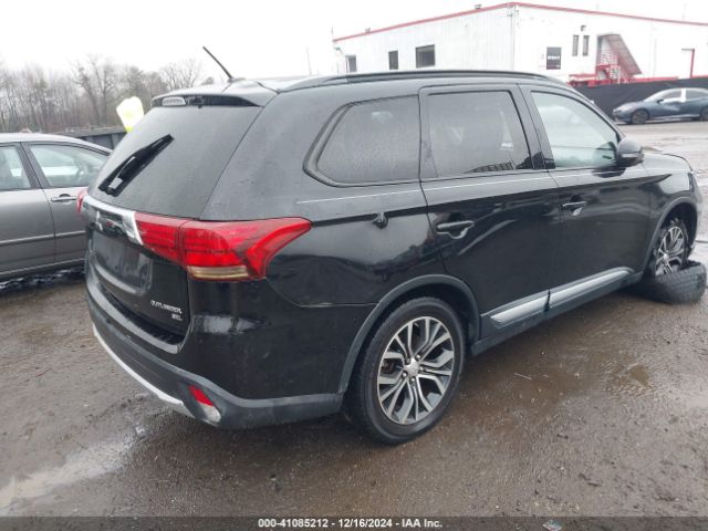 Photo 3 VIN: JA4AD3A30GZ036130 - MITSUBISHI OUTLANDER 