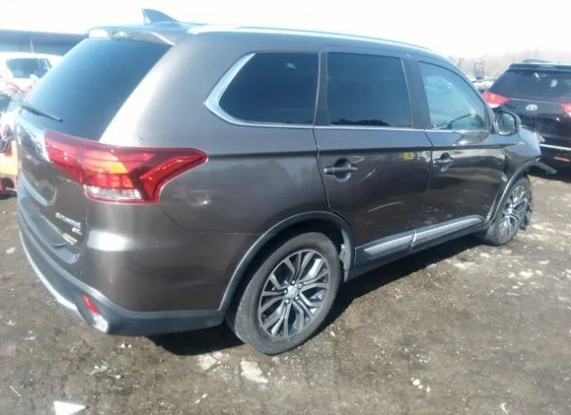 Photo 3 VIN: JA4AD3A34HZ038710 - MITSUBISHI OUTLANDER 