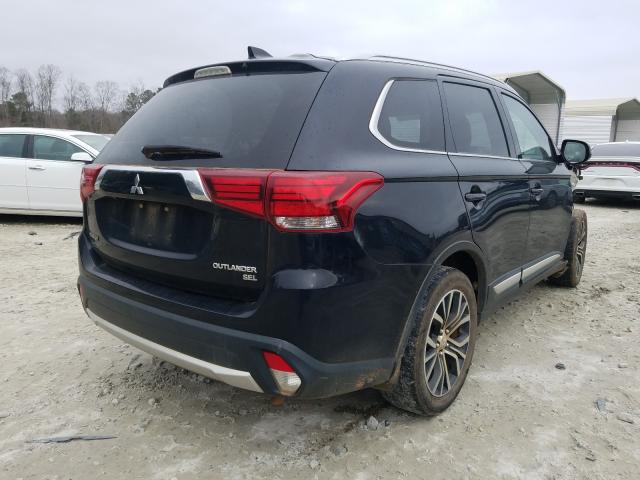 Photo 3 VIN: JA4AD3A36JZ003401 - MITSUBISHI OUTLANDER 