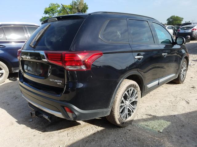 Photo 3 VIN: JA4AD3A37GZ026629 - MITSUBISHI OUTLANDER 