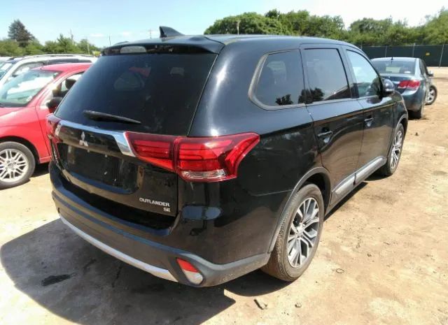 Photo 3 VIN: JA4AD3A37HZ057929 - MITSUBISHI OUTLANDER 