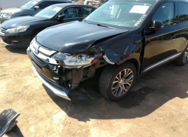 Photo 5 VIN: JA4AD3A37HZ057929 - MITSUBISHI OUTLANDER 