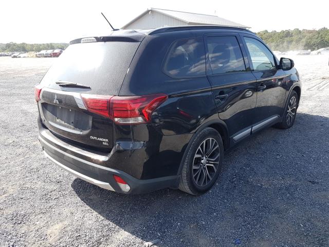 Photo 3 VIN: JA4AD3A38GZ012027 - MITSUBISHI OUTLANDER 