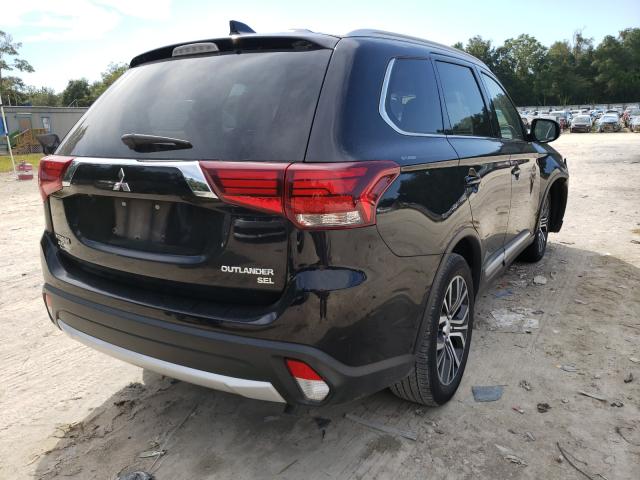 Photo 3 VIN: JA4AD3A38JZ069139 - MITSUBISHI OUTLANDER 