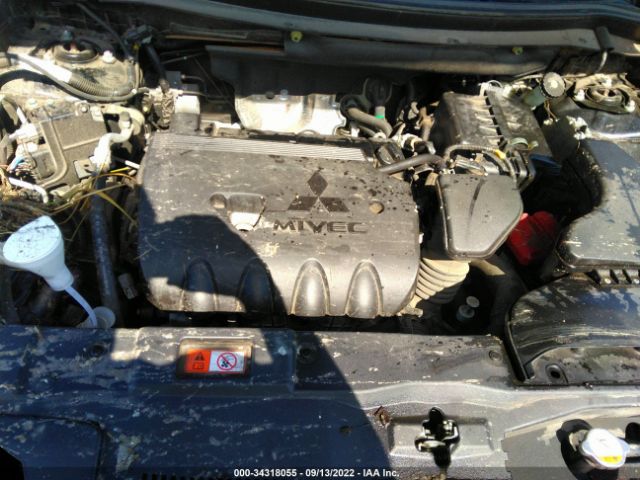 Photo 9 VIN: JA4AD3A3XKZ043871 - MITSUBISHI OUTLANDER 