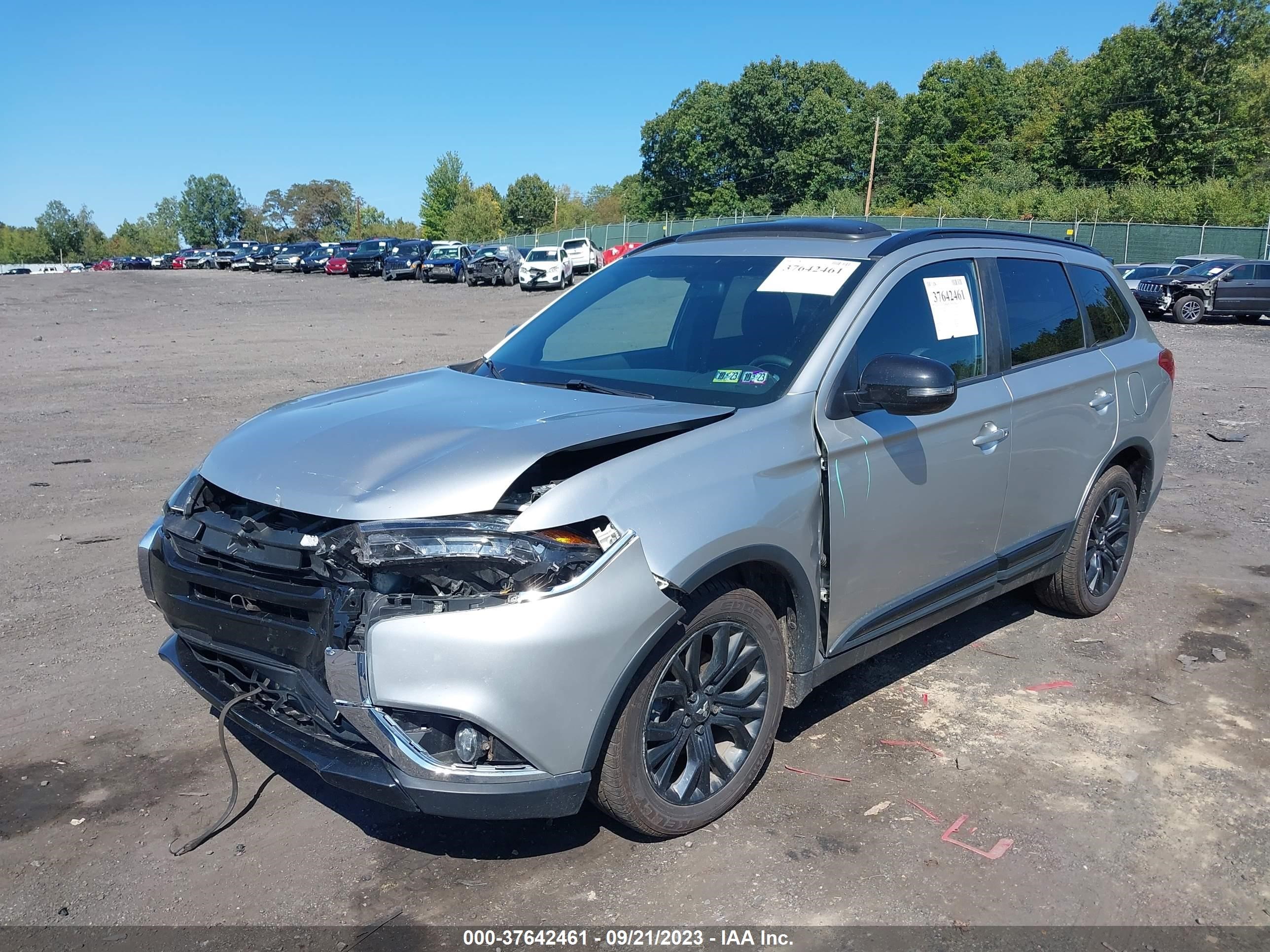 Photo 1 VIN: JA4AZ3A38JZ067909 - MITSUBISHI OUTLANDER 