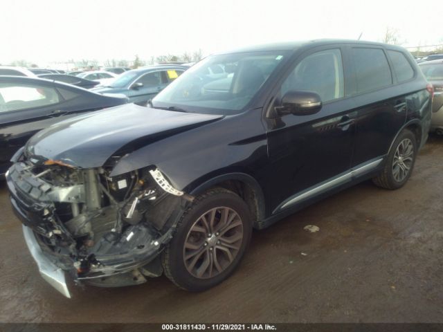 Photo 1 VIN: JA4AZ3A3XGZ011057 - MITSUBISHI OUTLANDER 