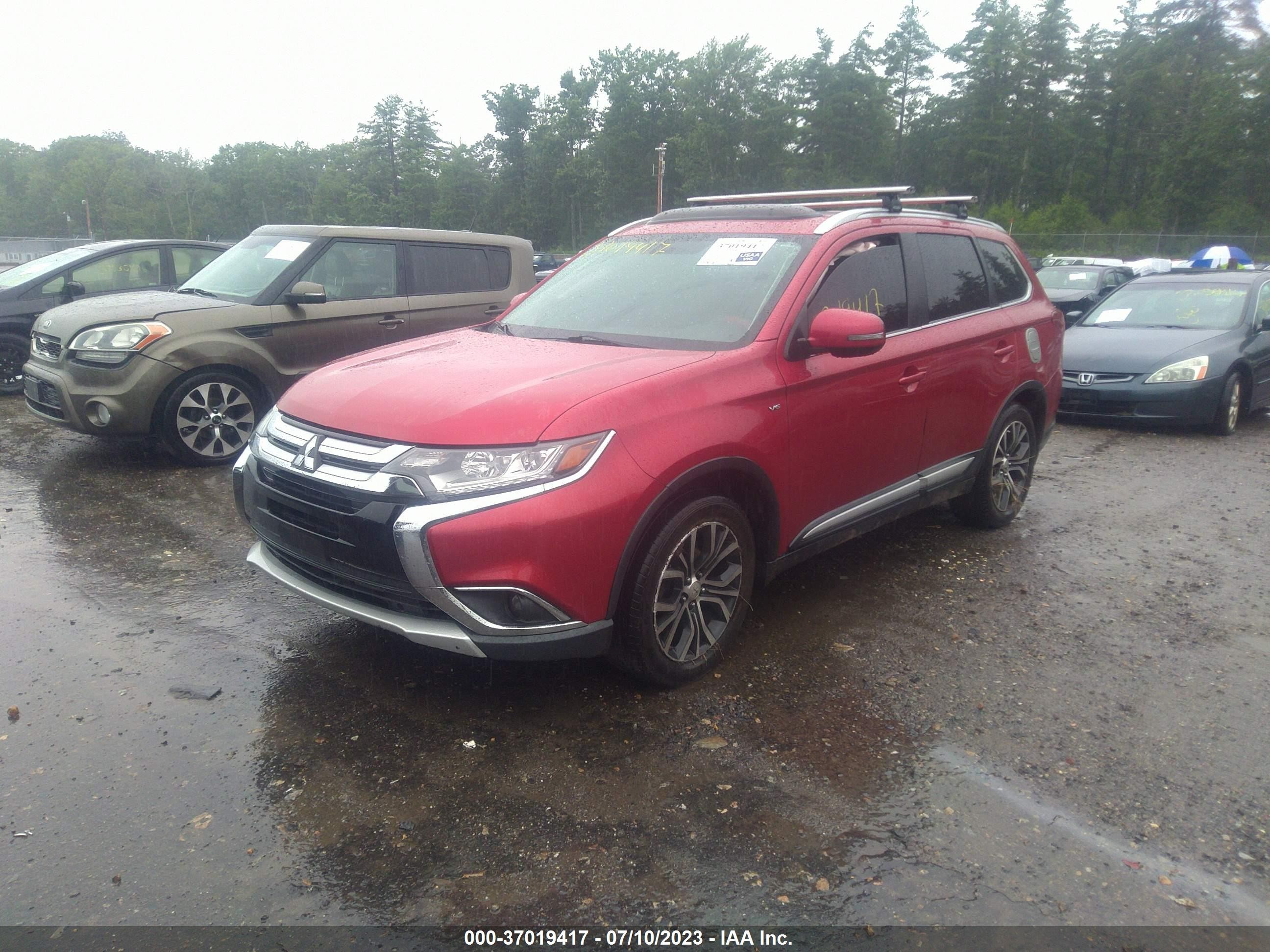 Photo 1 VIN: JA4JZ4AX9GZ031874 - MITSUBISHI OUTLANDER 