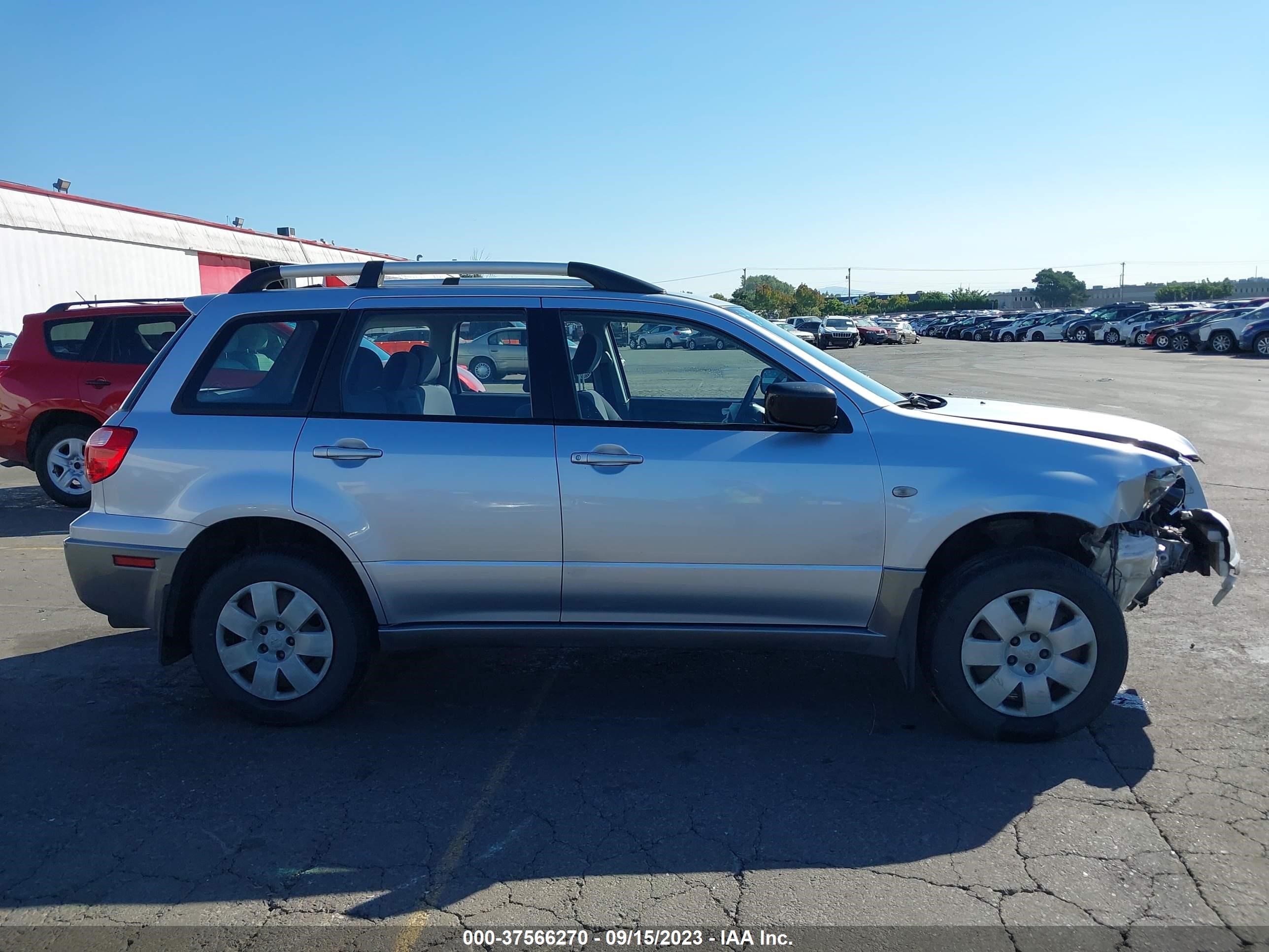 Photo 12 VIN: JA4LZ31F25U039769 - MITSUBISHI OUTLANDER 