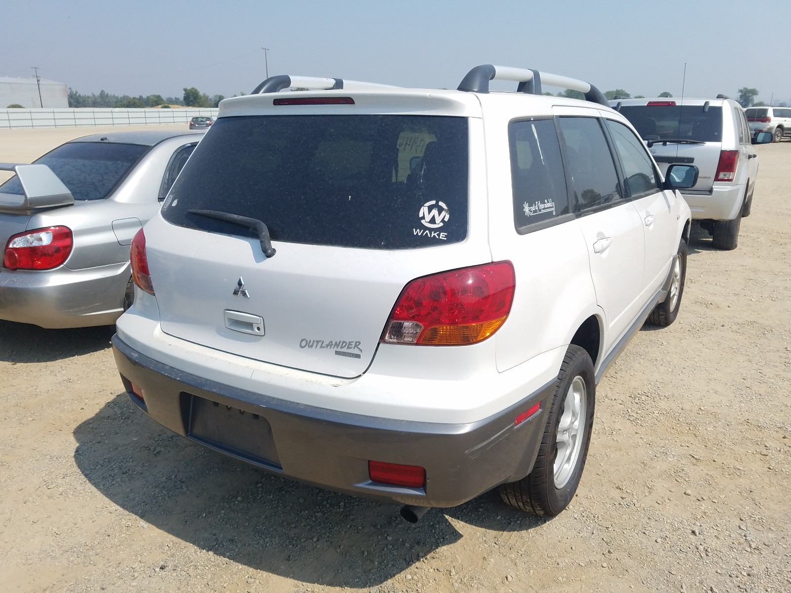 Photo 3 VIN: JA4LZ31FX4U061596 - MITSUBISHI OUTLANDER 