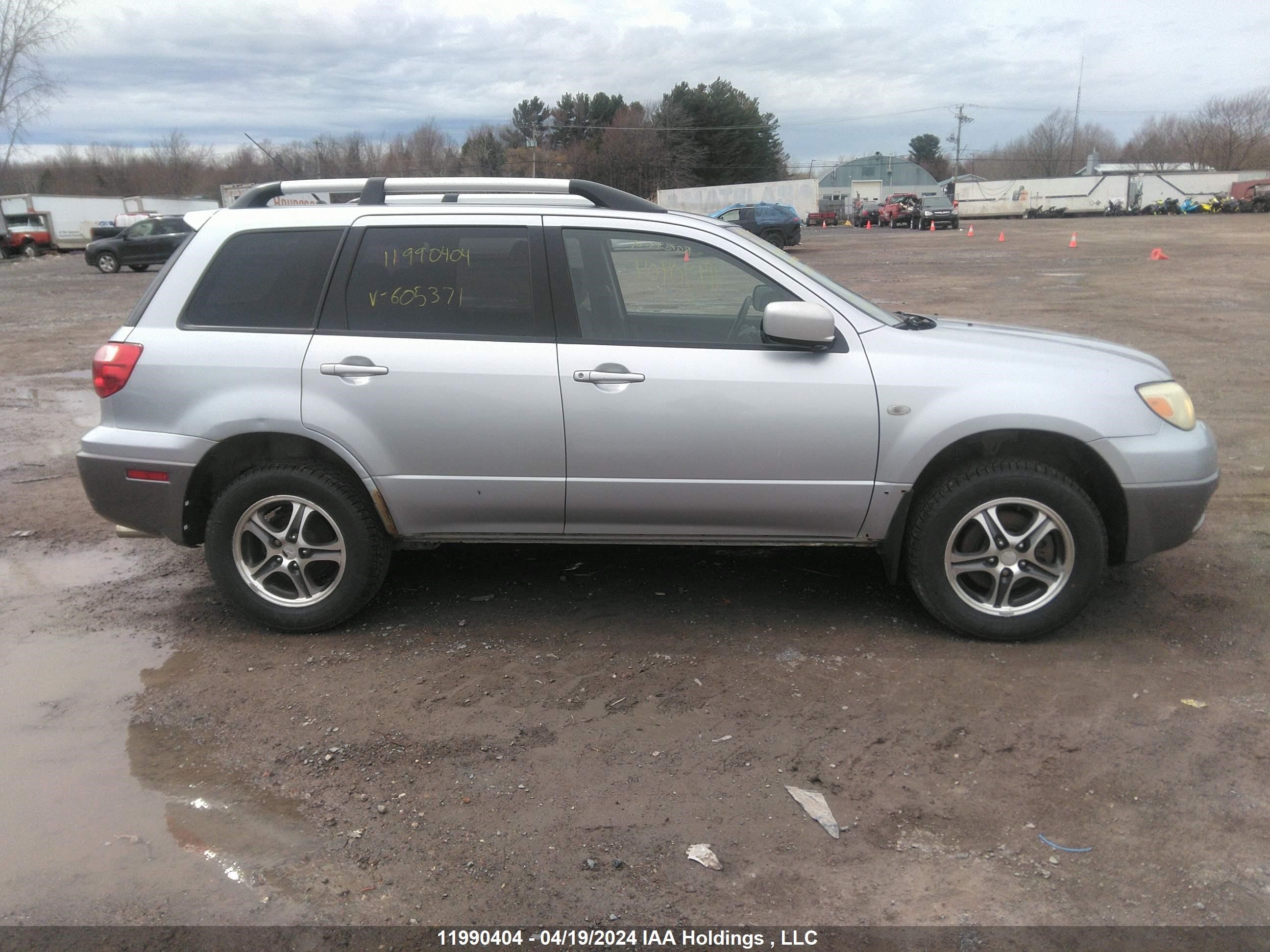 Photo 12 VIN: JA4LZ31FX5U605371 - MITSUBISHI OUTLANDER 