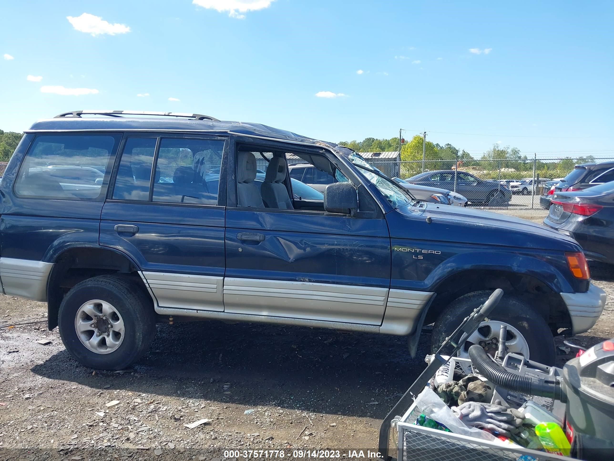 Photo 12 VIN: JA4MR41R9VJ004300 - MITSUBISHI MONTERO 