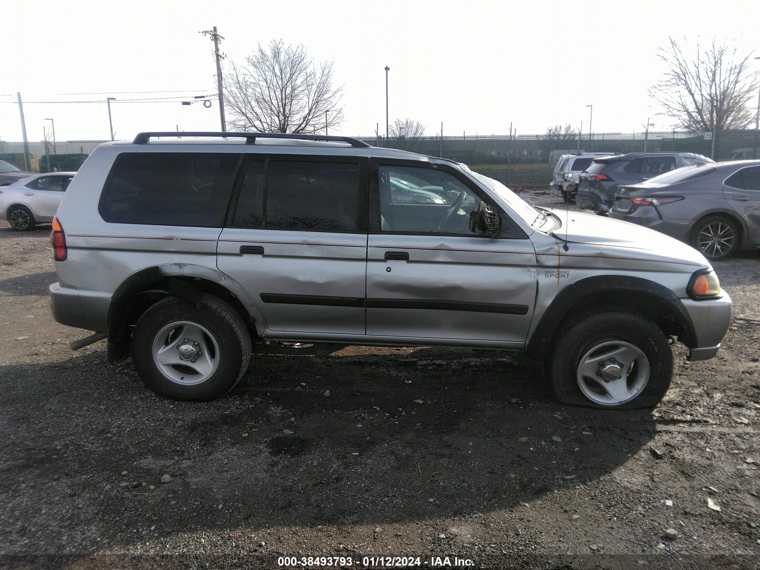 Photo 11 VIN: JA4MT21H91P048334 - MITSUBISHI MONTERO SPORT 