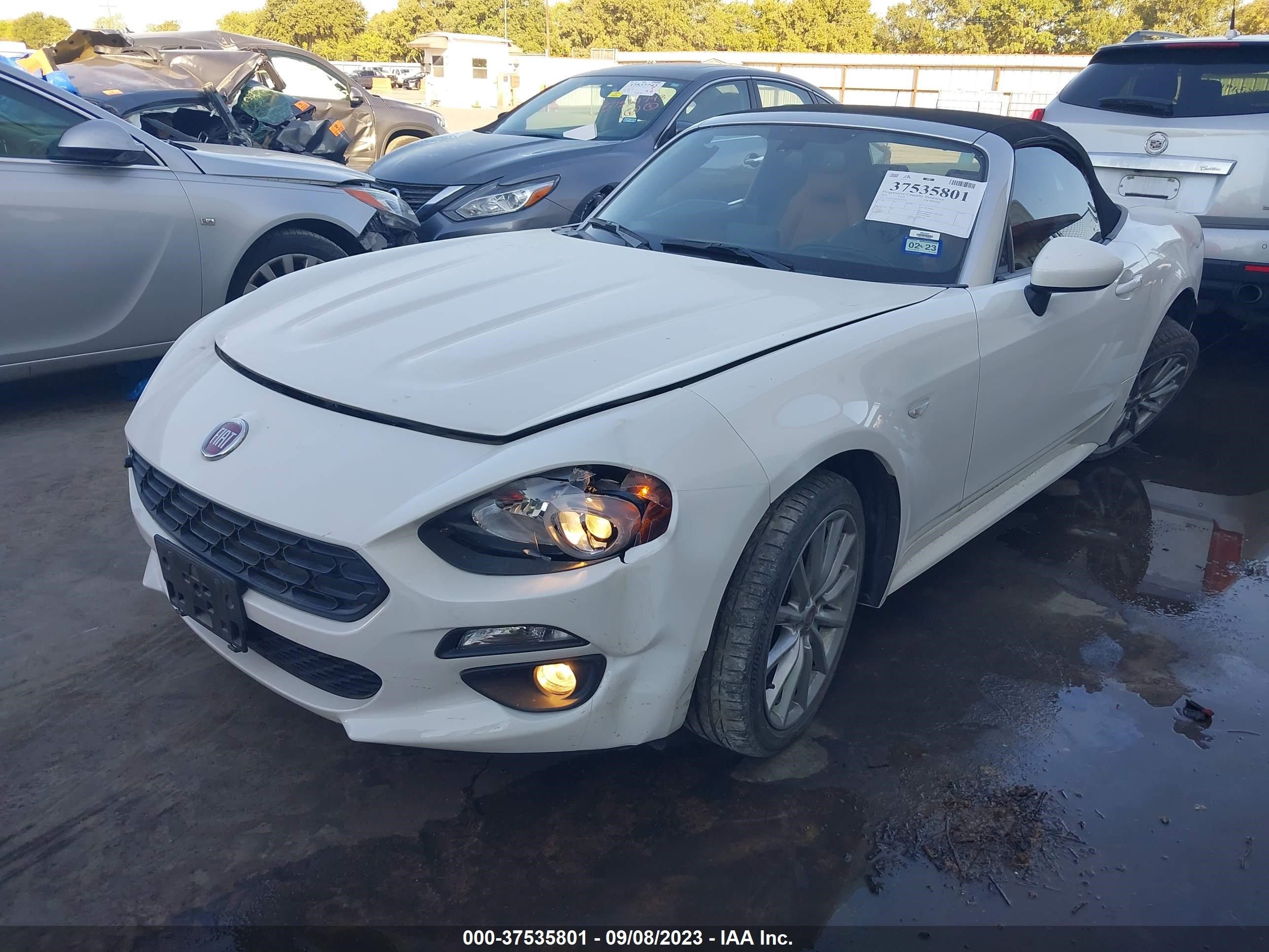 Photo 1 VIN: JC1NFAEK9L0144328 - FIAT 124 SPIDER 