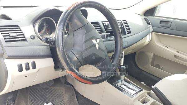 Photo 11 VIN: JE3AB36A3HU715921 - MITSUBISHI LANCER 