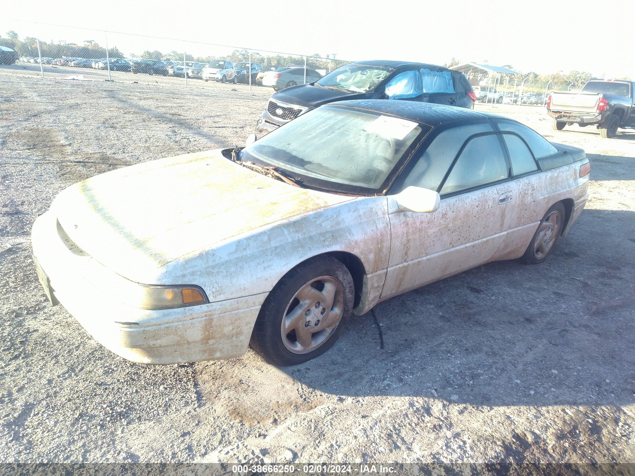 Photo 1 VIN: JF1CX3434NH104147 - SUBARU SVX 