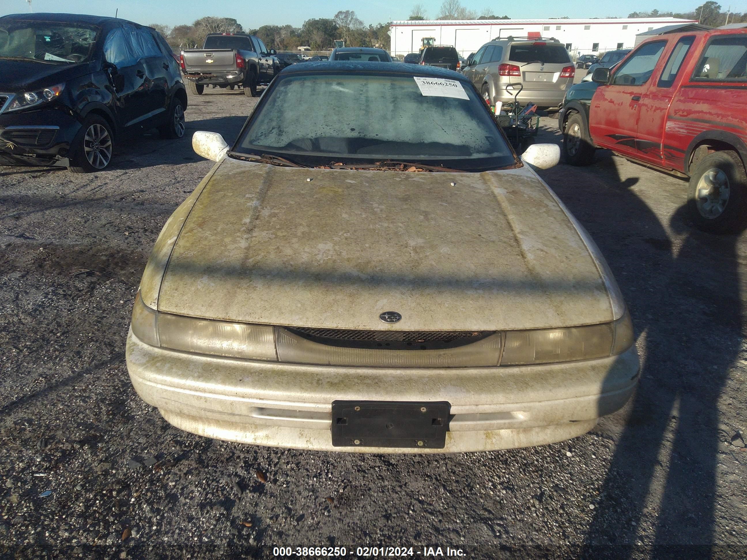 Photo 10 VIN: JF1CX3434NH104147 - SUBARU SVX 