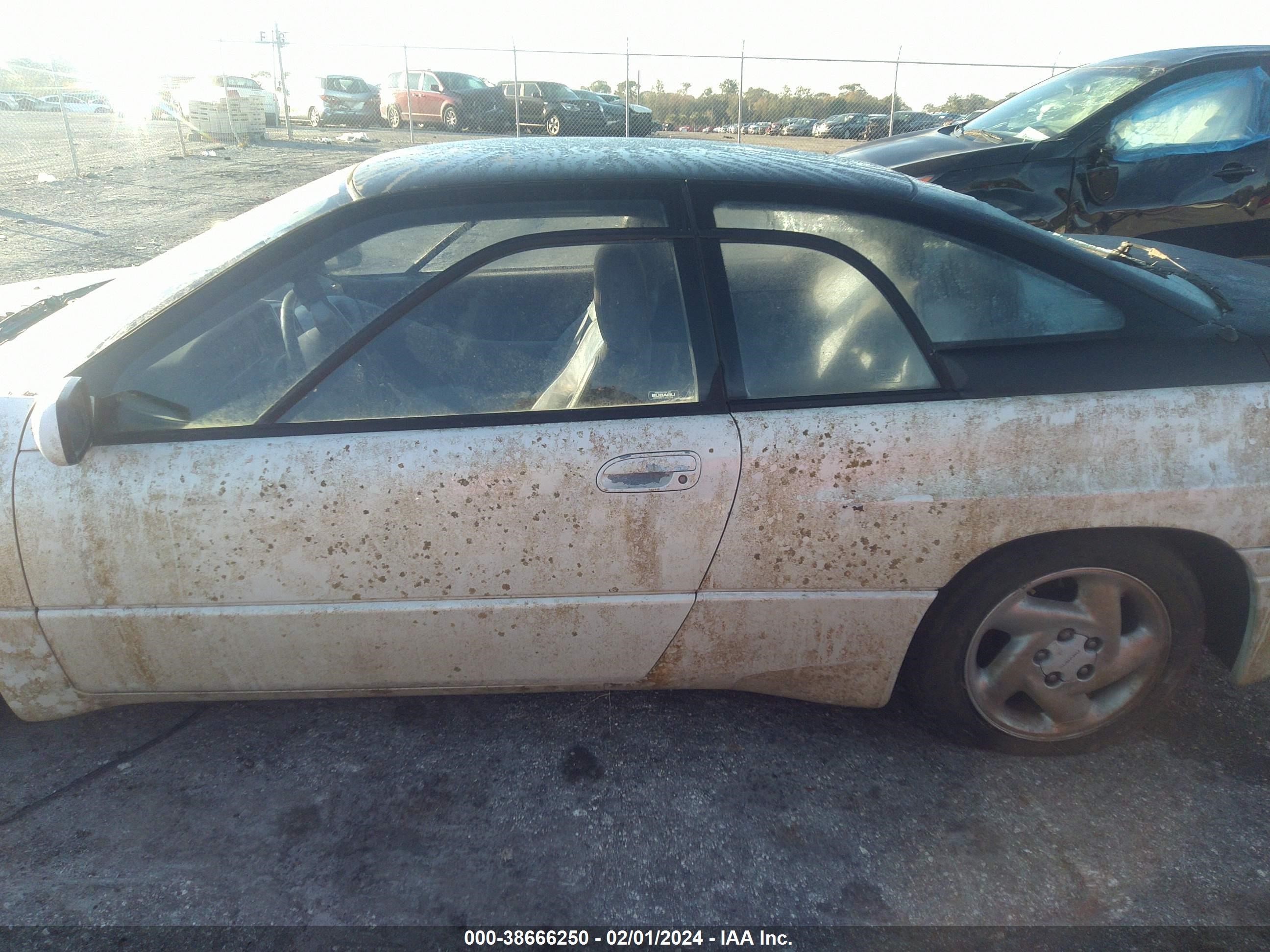 Photo 12 VIN: JF1CX3434NH104147 - SUBARU SVX 