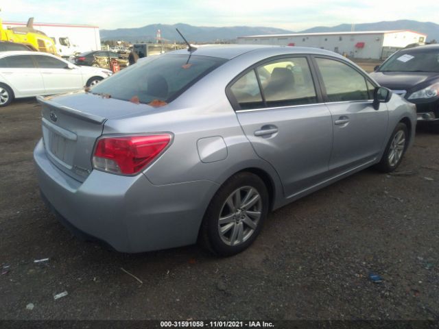 Photo 3 VIN: JF1GJAB6XGH011477 - SUBARU IMPREZA SEDAN 