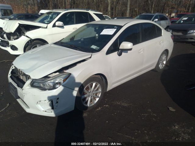 Photo 1 VIN: JF1GJAC62EH024395 - SUBARU IMPREZA SEDAN 