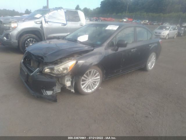 Photo 1 VIN: JF1GJAH61CH021879 - SUBARU IMPREZA SEDAN 