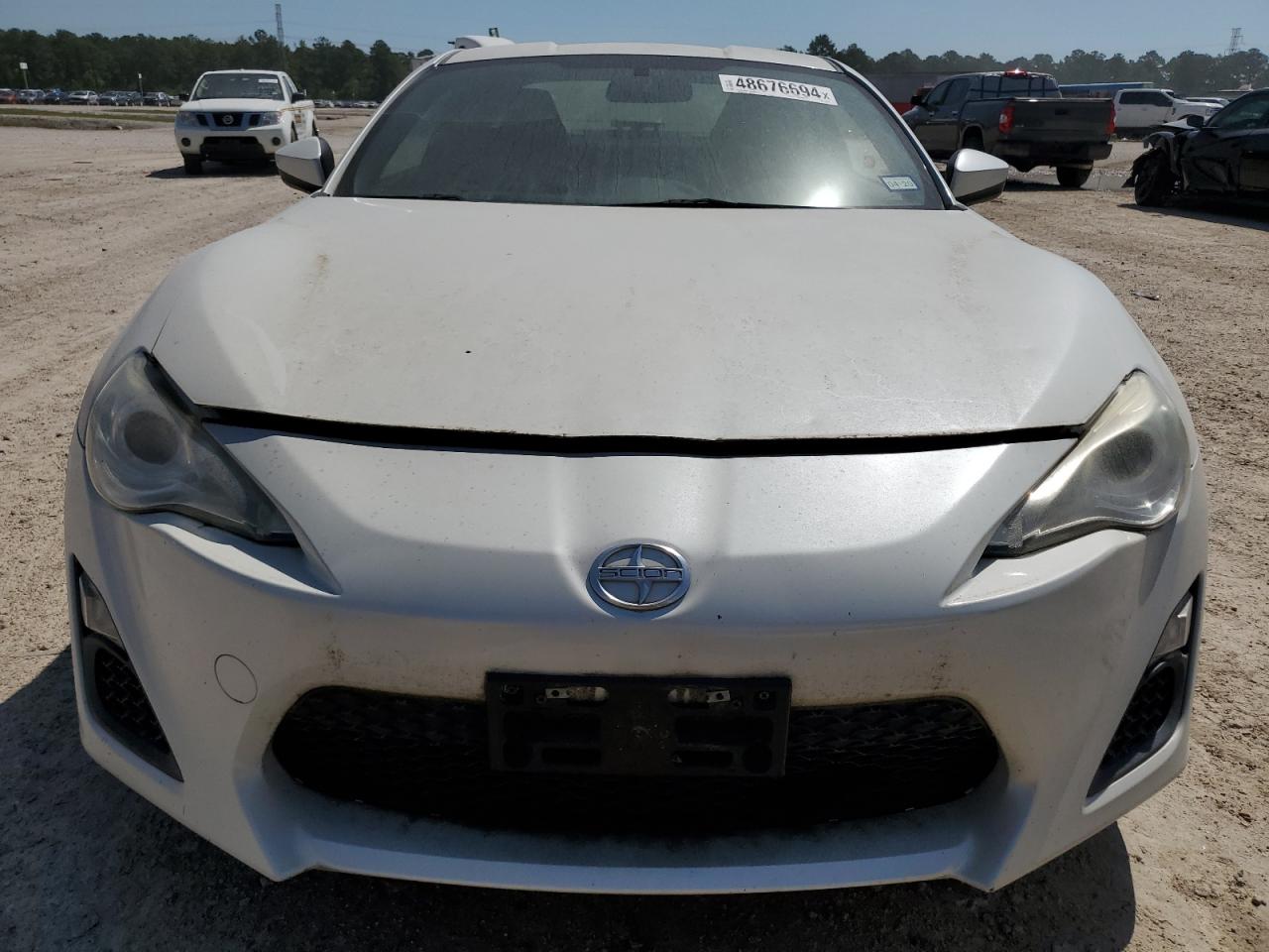 Photo 4 VIN: JF1ZNAA10D2724633 - TOYOTA SCION 