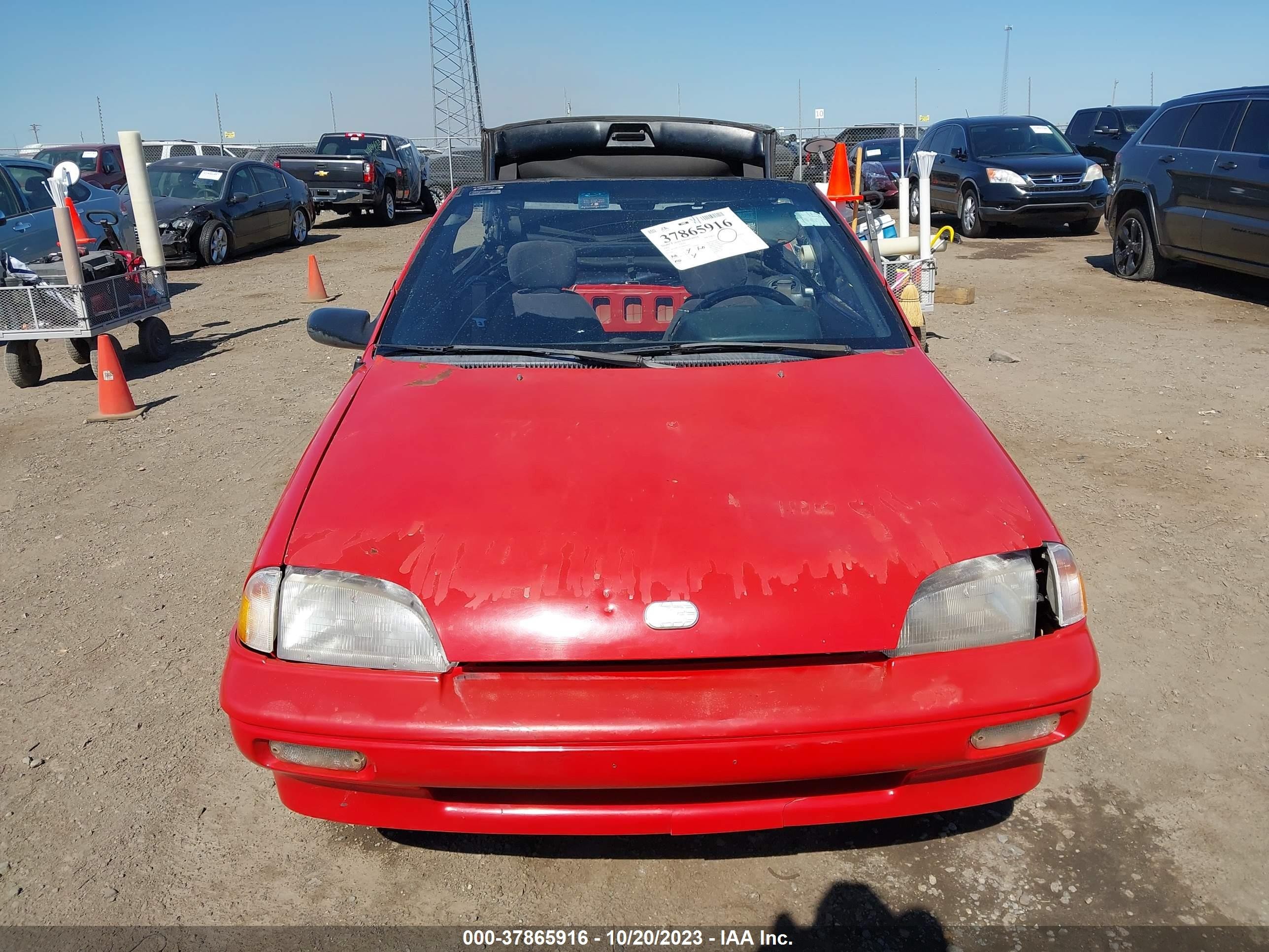 Photo 11 VIN: JG1MR3361MK609917 - GEO METRO 