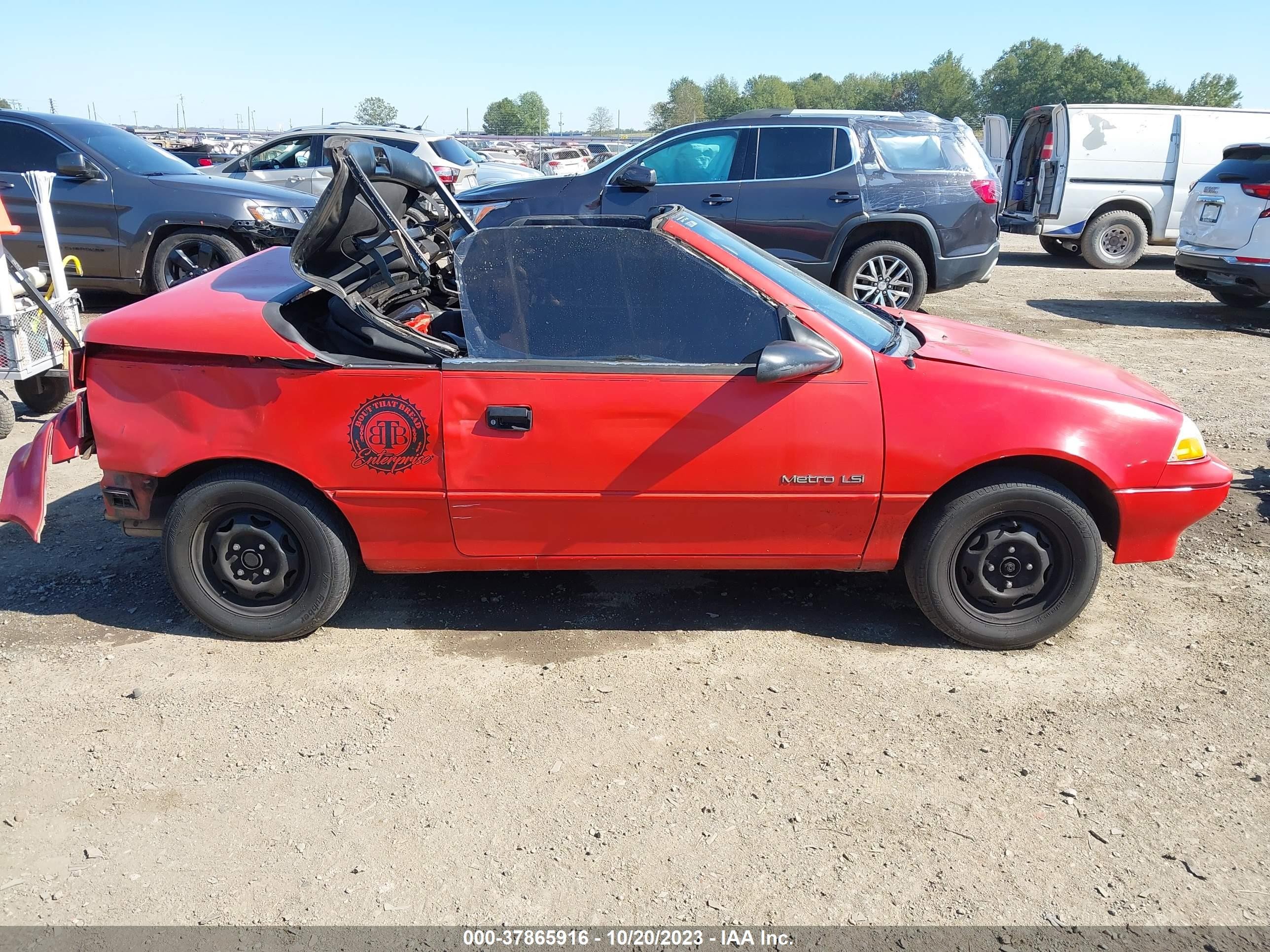 Photo 12 VIN: JG1MR3361MK609917 - GEO METRO 