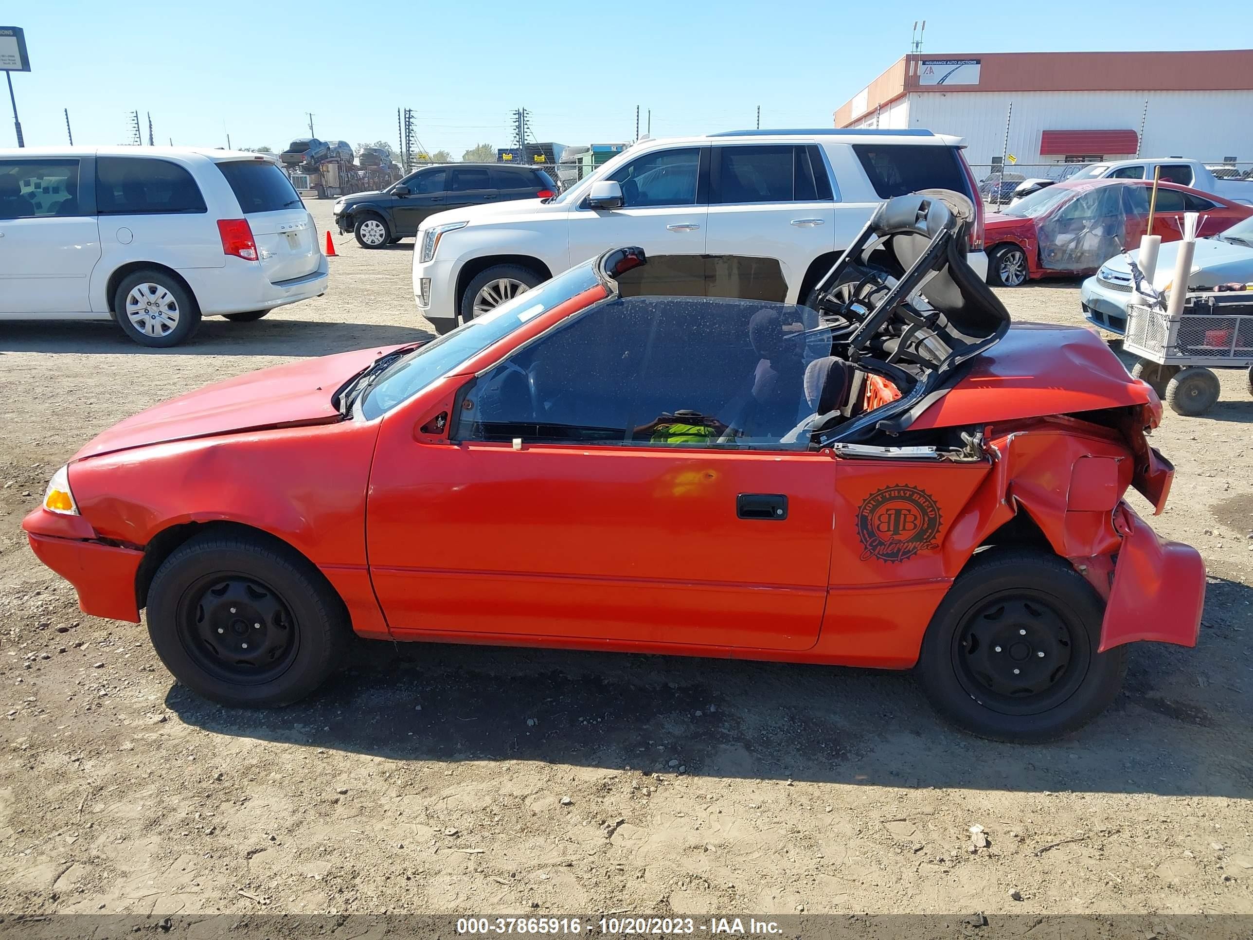 Photo 13 VIN: JG1MR3361MK609917 - GEO METRO 