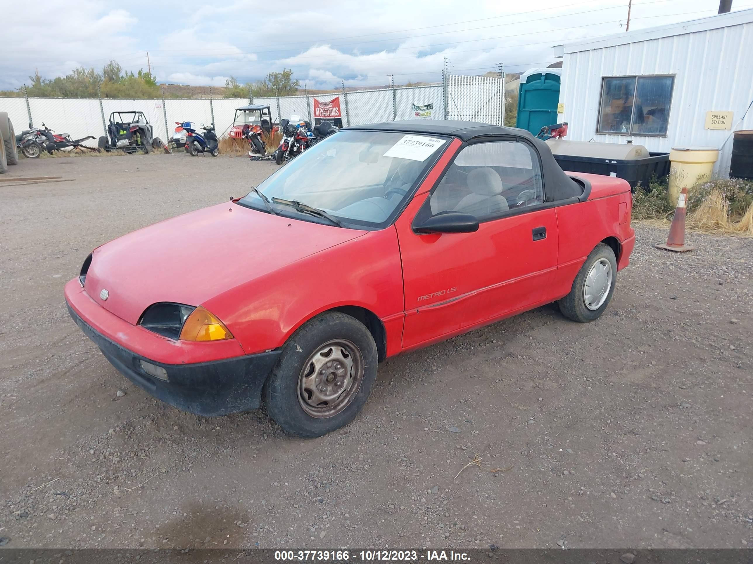 Photo 1 VIN: JG1MR3368NK212965 - GEO METRO 