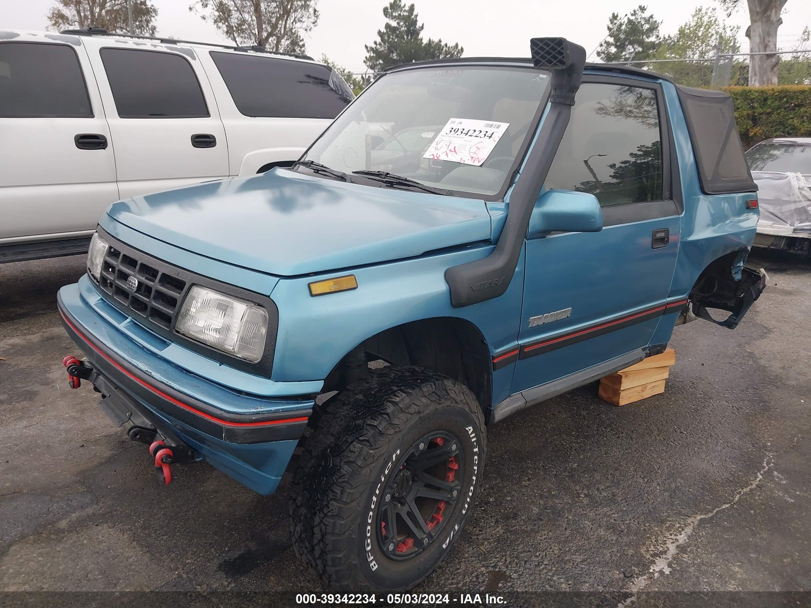 Photo 1 VIN: JGCBJ18U0KW827189 - GEO TRACKER 