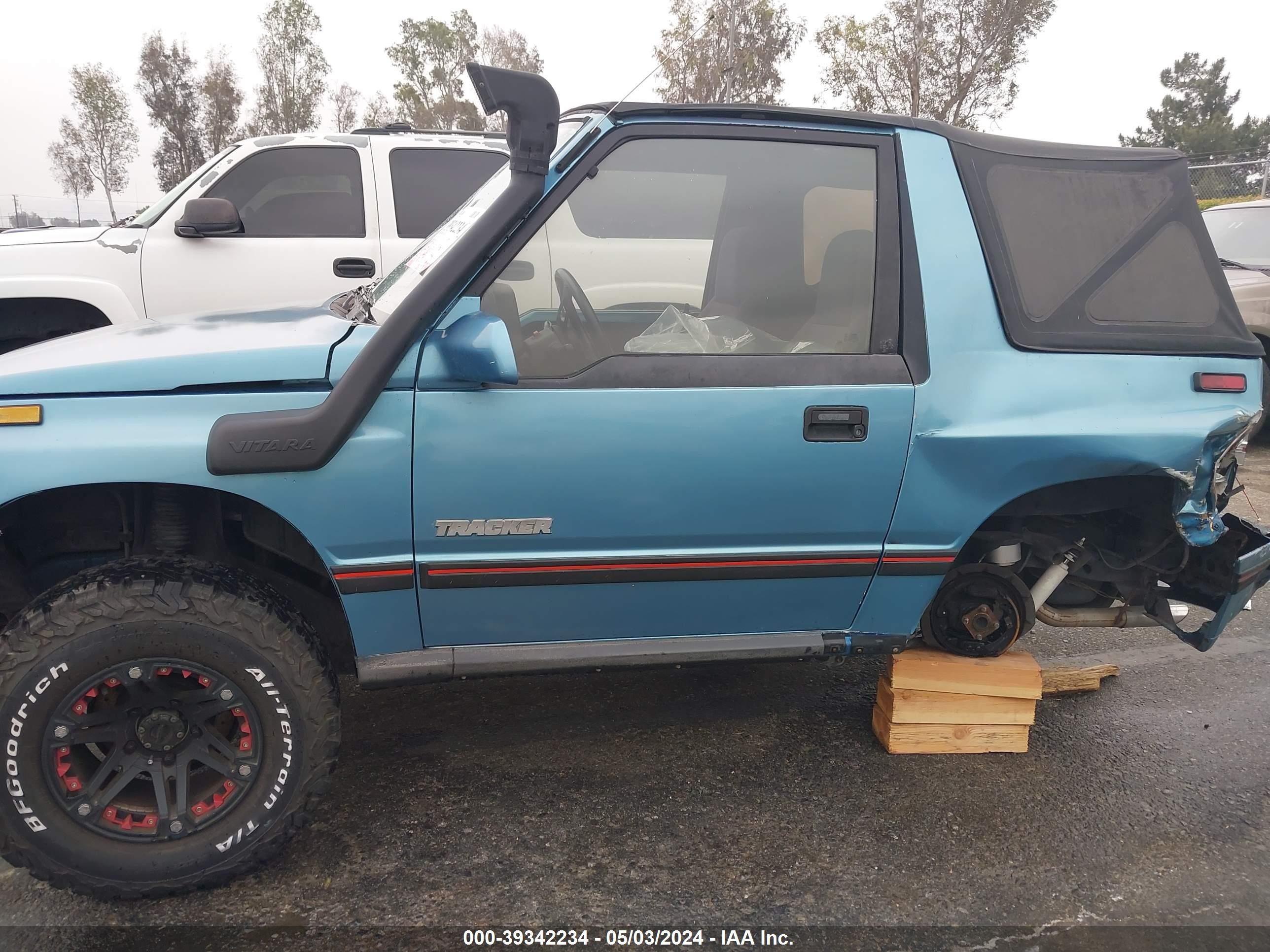 Photo 13 VIN: JGCBJ18U0KW827189 - GEO TRACKER 