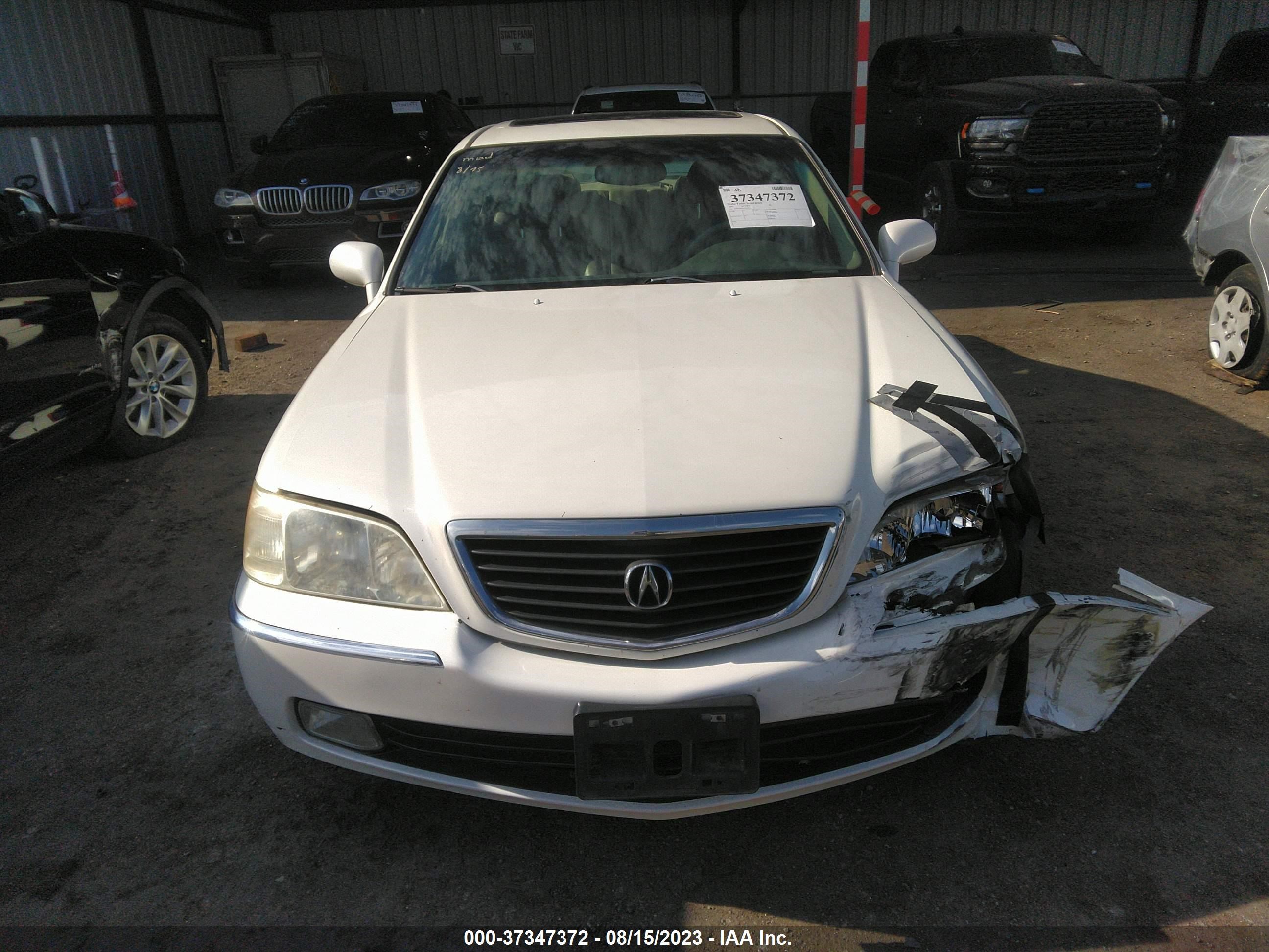 Photo 11 VIN: JH4KA9658YC010216 - ACURA RL 