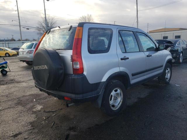 Photo 3 VIN: JHLRD684X4C013948 - HONDA CR-V LX 