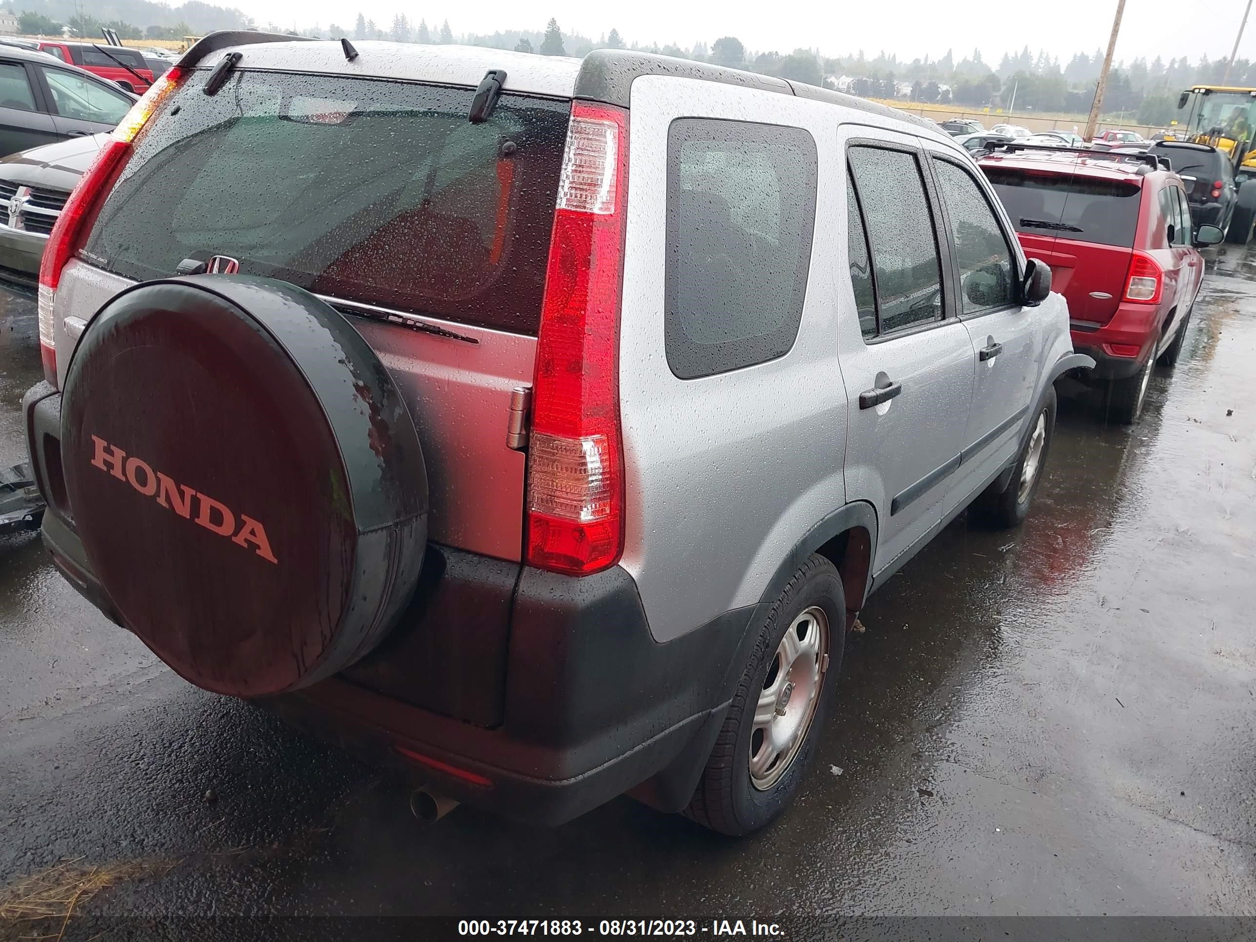 Photo 3 VIN: JHLRD785X5C044035 - HONDA CR-V 