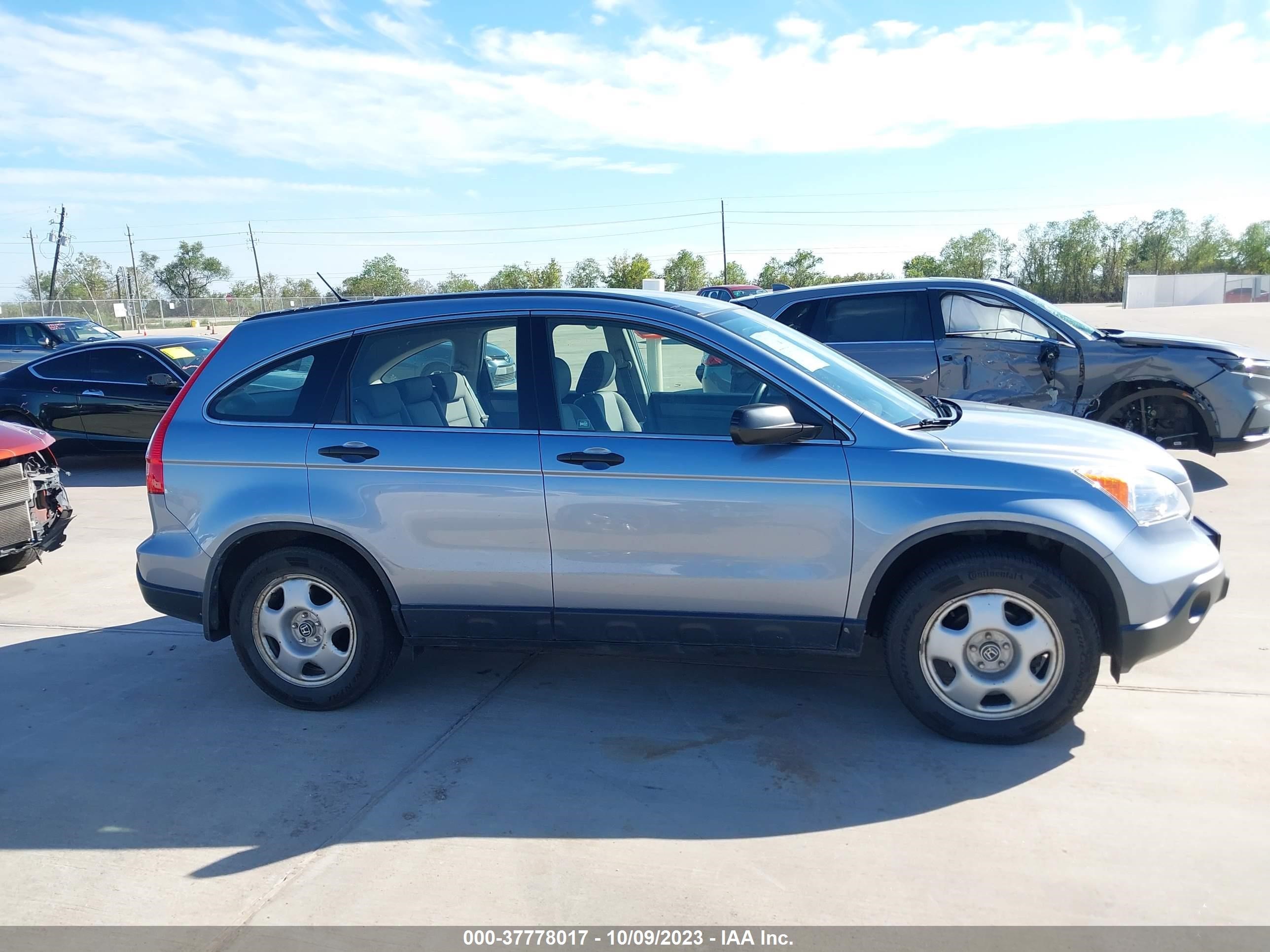 Photo 12 VIN: JHLRE483X9C017854 - HONDA CR-V 