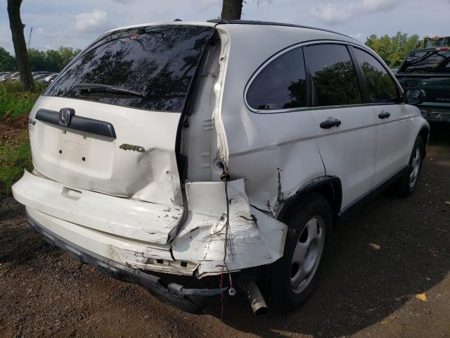 Photo 3 VIN: JHLRE4H34BC020920 - HONDA CR-V LX 