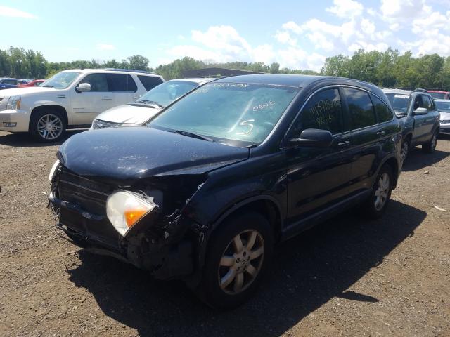 Photo 1 VIN: JHLRE4H41BC004263 - HONDA CR-V SE 