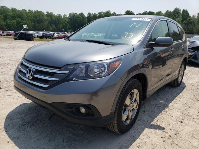 Photo 1 VIN: JHLRM4H51CC000582 - HONDA CR-V EX 