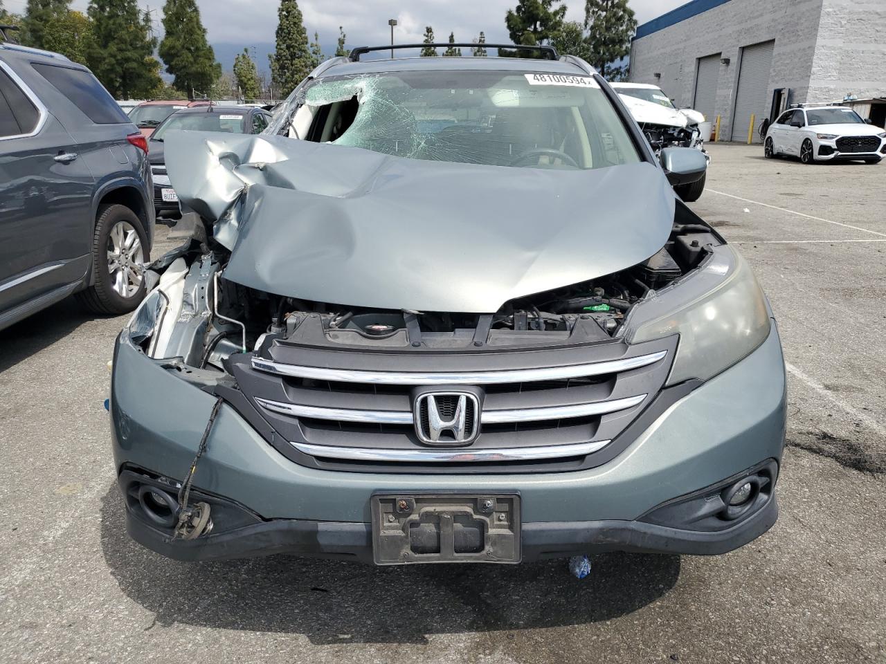 Photo 4 VIN: JHLRM4H72CC023497 - HONDA CR-V 