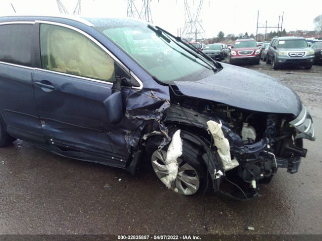 Photo 5 VIN: JHLRM4H77CC029375 - HONDA CR-V 