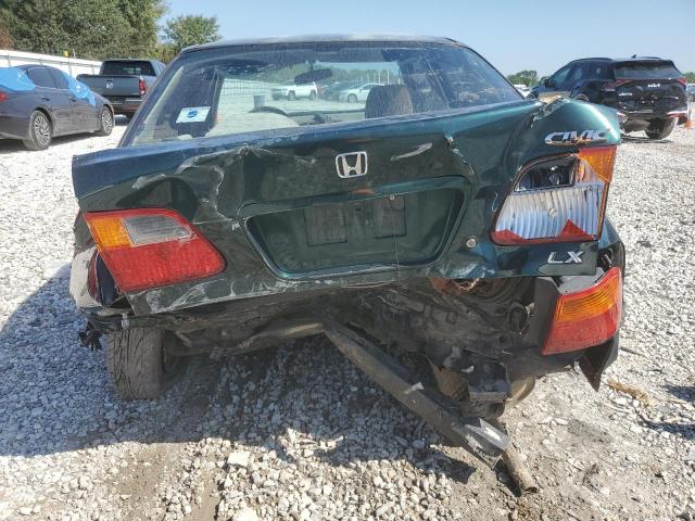 Photo 5 VIN: JHMEJ6670YS011122 - HONDA CIVIC LX 