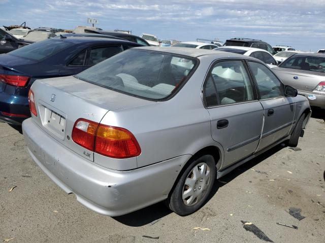 Photo 2 VIN: JHMEJ6678XS004076 - HONDA CIVIC LX 